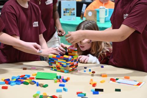 students build lego structure